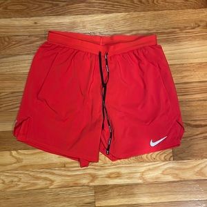 Nike men’s small orange dry fit running shorts. Excellent condition. Worn once